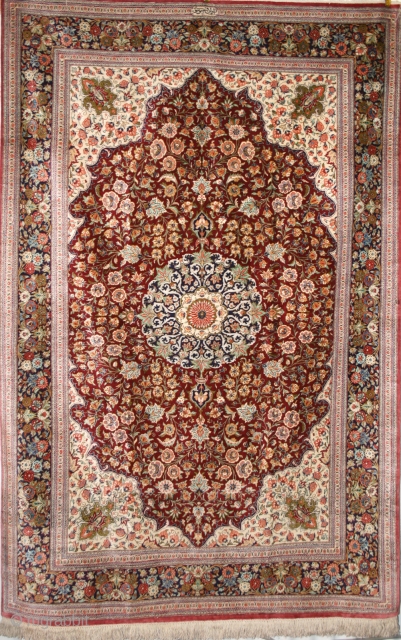 A silk on silk Qum rug of high quality, a collectors piece. 2.10 x 1.35 (6' 10" x 4' 6")             