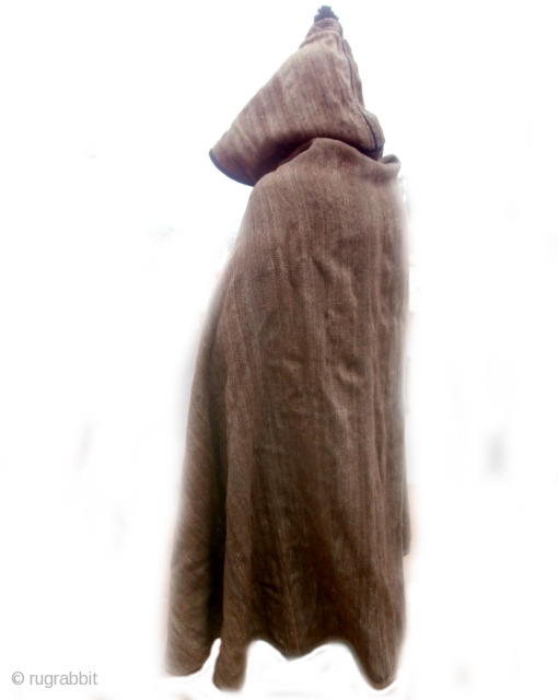 MOROCCAN BERBER MAN'S CAPE WITH HOOD Many types of cape, or jellaha, are worn by men throughout Morocco. This is an example known as "al bornoz" and is used by shepherds to  ...