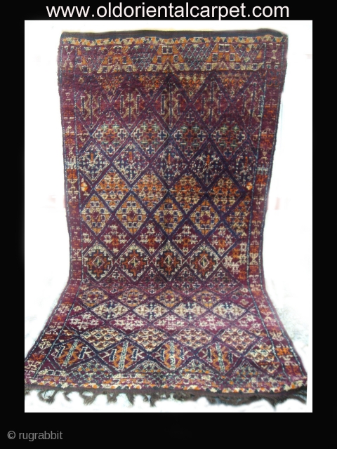  MOROCCAN MIDDLE ATLAS BERBER CARPET - a rare, richly coloured and deep piled old carpet from the Beni M`Guild Berber group of the western Middle Atlas. The piece is in excellent  ...