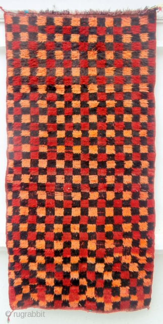 MOROCCAN MIDDLE ATLAS BERBER RUG originating from the Berbers of the region of Boujad where it was woven around 40/50 years ago. It is a piece which was used by a Berber  ...