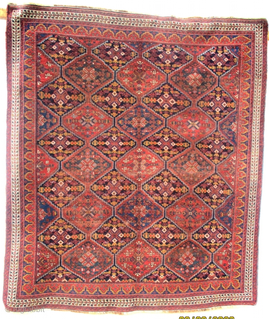 ANTIQUE AFSHAR RUG FROM THE REGION OF KIRMAN IN SOUTHERN PERSIA. The squarish shape is always a major factor in identifying Afshar weaving, both of their rugs and flat woven soumaks. Whereas  ...