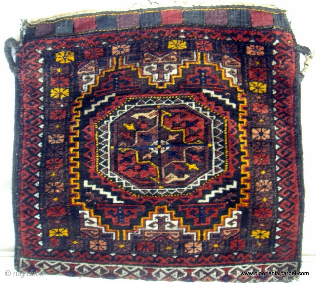 PERSIAN BALOUCH / BELOUCH BAG. A piece to enhance a serious collection. It is from the Salor Khani sub-group and dates from the early 20th century. It is soft and supple with  ...