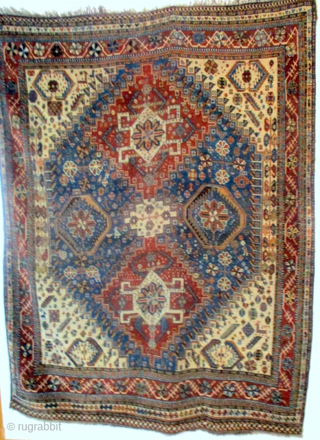 ANTIQUE KASHKAI RUG from the Province of Fars in south west Persia. This piece is original and intact and has the extra end chequered borders associated with the top examples. The pile  ...