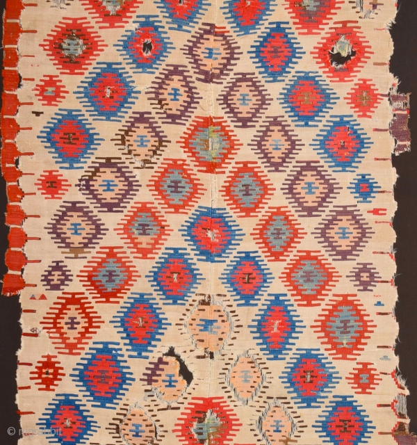 Early example!A fragment of a two-panel kilim from the surroundings of Central Anatolian Sivas, 18th Century Kilim Fragment. It has perfect colors and archaic ends. Size 135 x 230 cm It has  ...