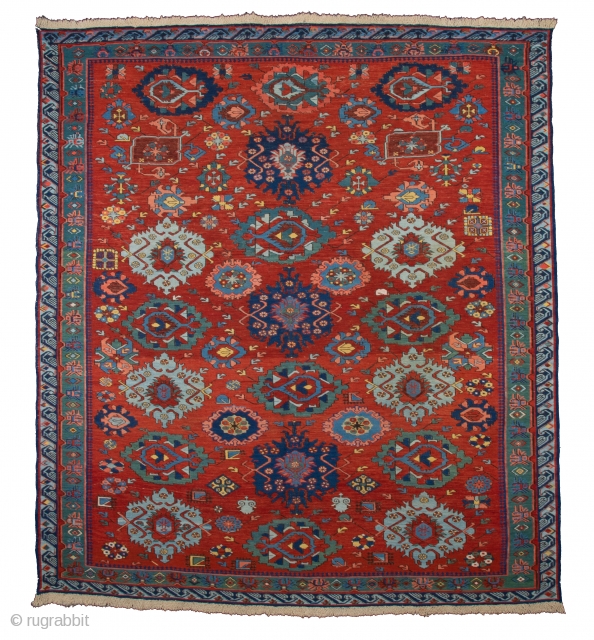 Caucasian 1860s Zeikhur sumakh Complex small-pattern repeat of octagons, eight-pointed stars, palmettes, rosettes and many abstract animals is arranged symmetrically around the vertical axis of the red-ground field. The design reminiscent of  ...