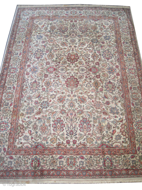 

Tabriz Persian signed, knotted circa 1935, 220 x 307 cm, ID: P-5640
The background and the surrounded large border are ivory, all over floral design, in acceptable condition, the knots are hand spun  ...