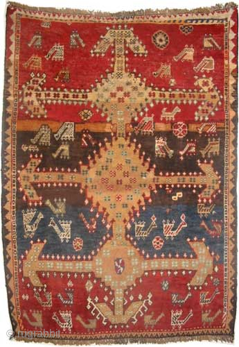 

Gabbeh Louri Persian, knotted circa 1890 antique, 115 x 157 cm, ID: T-702
Vegetable dyes, the warp and the weft threads are mixed with wool and goat hair, the black knots are oxidized,  ...