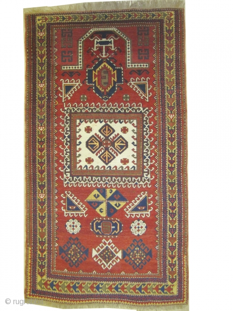 	

Fachralo Kazak prayer Caucasian circa 1910 antique, collector's item, Size: 240 x 132 (cm) 7' 10" x 4' 4"  carpet ID: H-319
The brown color is oxidized, vegetable dyes, the knots are  ...