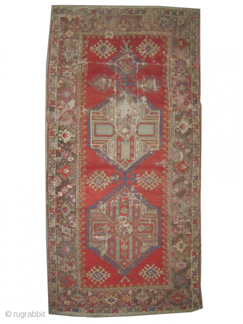 	

Anatolian rug, antique. Collector's item, Size: 232 x 115 (cm) 7' 7" x 3' 9"  carpet ID: K-1316
Poor condition, the black colour is oxidized, the knots are hand spun wool, the  ...