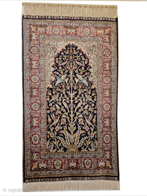 Kayseri Turkish prayer rug 100% silk, 71 x 122 cm, knotted circa 1965
720'000 knots in square meter, indigo background, in excellent condition, rare example.         