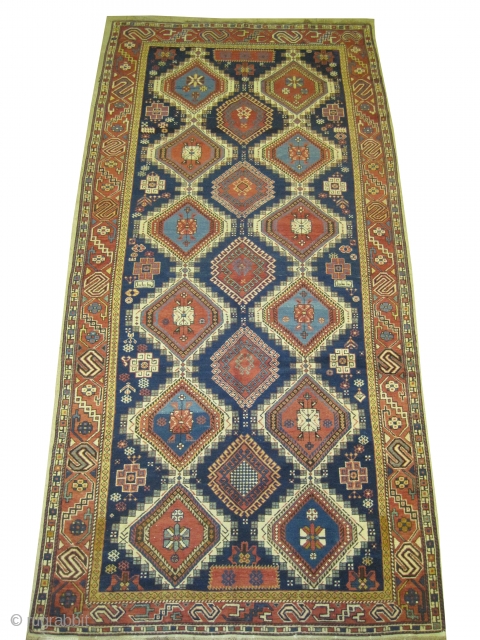 	

Shirvan Caucasian, dated 1333 = 1914 antique,  294 x 144 (cm) 9' 8" x 4' 9"  carpet ID: H-93
High pile, in good condition, the black color is oxidized, the knots  ...