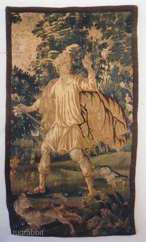 

French tapestry antique, collectors item, 142 x 83 cm, ID: A-959
A fragment, hand woven with hand spun wool,in good shape. A prince with his dog in the forest.

     