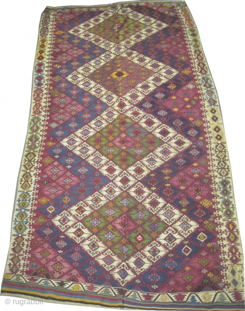 
 Anatolian kilim, woven circa in 1870, antique, collector's item, 339 x 183 (cm) 11' 1" x 6'  carpet ID: A-467
Woven with hand spun wool, from the center two original parts  ...