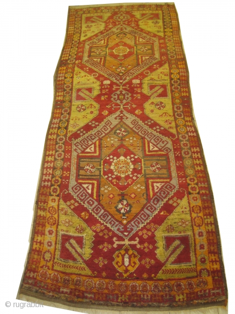 Karapinar Turkish, semi antique, 137 x 360 cm, carpet ID: SRO-11
The background is warm red with two big medallions, thick pile in perfect condition.         