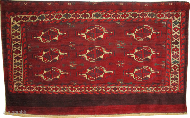 
Yemouth Turkmen tchuval, semi antique, collectors item, 74 x 120 cm, ID: ABS-1
The knots are hand spun lamb wool. Thick pile in excellent condition and in its original shape.
    