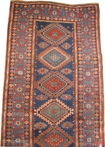 
Fachralo-Kazak Caucasian circa 1910 antique. Size: 324 x 140 (cm) 10' 7" x 4' 7" 
 carept ID: RS-479
The background color is indigo with 7 center medallions, the surrounded large border is  ...