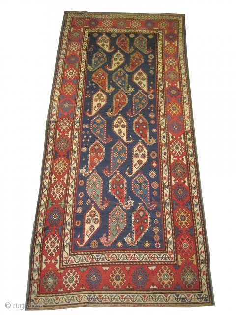 Saliani Caucasian knotted circa in 1865, antique. Collector's item. Size: 290 x 116 (cm) 9' 6" x 3' 10"  carpet ID: V-181
The background is indigo with all over Mirabotha design, the  ...