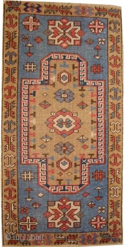 
Fachralo Kazak Caucasian knotted circa in 1915 antique. Collector's item, 92 x 48 (cm) 3'  x 1' 7"  carpet ID: K-5608
The center medallion and the surrounded large border are soft  ...