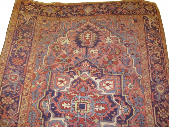 

Heriz Persian knotted circa 1905 antique, 208 x 303 cm, ID: P-3727
Vegetable dyes, the black knots are oxidized, the knots are hand spun wool, the center medallion is rust with indigo, the  ...