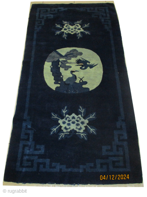 Chinese knotted circa 1905 antique, 78 x 148 cm, ID: KZM-10 
Indigo background, vegetable dyes, thick pile, in perfect condition, the knots are hand spun lamb wool.      