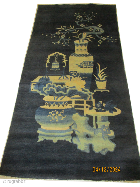 Chinese knotted circa 1910 antique, 93 x 181 cm, ID: KZM-9
The knots are hand spun wool, vegetable dyes, indigo background, vase design, thick pile, in perfect condition      