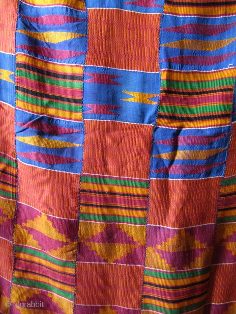 Ghanean Asanti cloth.  24 strips of 9cm widths.  Approximately 320cm x 240cm.
Mostly cotton with a great variety of supplementary weft float patterns. A fine example.  Very good condition.   ...