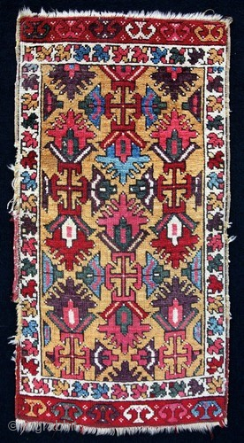 For the connoisseur collector, this rare yellow-ground Central Anatolian Yastik from the Konya/Aksaray region, early 19c. Note the diverse natural palette and aubergine blossoms. Selvages have been have been stabilized.

Collection of Dennis  ...