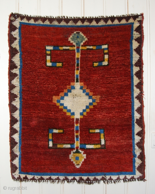 Beautiful totemic small Gabbeh, 27 x 32 inches/67 x 80cm, circa 1900, natural dyes, multiple wefts, some red in the field mixed: very slightly tip faded; very good condition ,even middle high  ...