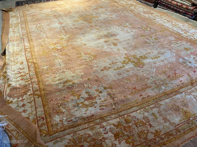 Antique Oushak rug approx 12x14 feet more pics upon request                       