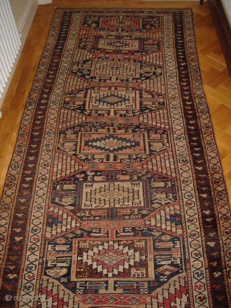 North West Persian Rug, circa 1910 
2.90 m x 1.10 m (9 ft. 8in. x 3ft. 8in.)
                