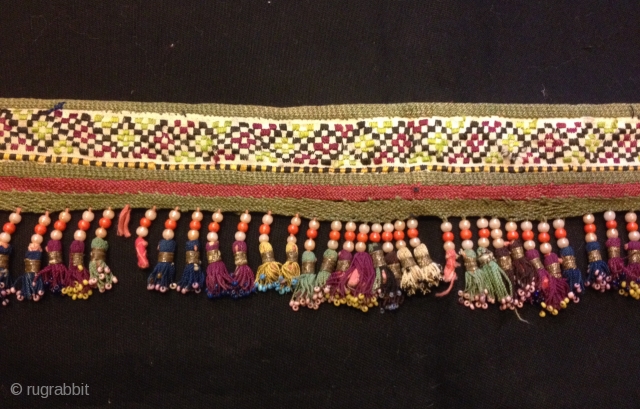 Old Uzbek silk tassel ethnic and tribal collectible tassel hanging decorative tassel

Size: 80 cm x 8 cm
Tassel height: 3 cm

100% handmade

VINTAGE UZBEK TASSELS :
”Segusha”( Triangle) is a decorative embellishments, whose function, was  ...