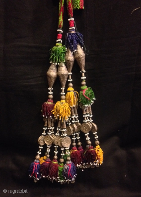 Vintage Uzbek afghan tribal silver tassel

Size :
Height : 30 cm (with out rope size)

100 handmade

VINTAGE UZBEK TASSELS :
”Segusha”( Triangle) is a decorative embellishments, whose function, was to decorate the beddings tucked away  ...