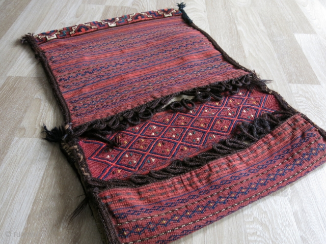 Turkmen Ersari saddlebag. Very fine pile skirt and corners. Great saturated colors. It has some stains in the back as can be seen in the last photo. Circa 1910-20s.

Size: 50 cm x  ...