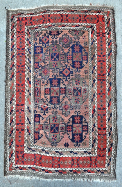 Baluch rug with Gurbaghe Guls and rare border, all natural colors including a nice lavender and purple, 19th c. piece in good original condition without repairs.
Side selvages in good original condition and  ...