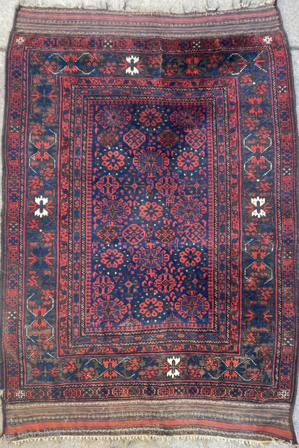 Timuri Baluch Rug with Khaf Guls - Good even pile throughout, intact kilim ends, fishbone braided selvages in good shape bar small damage on the lower left in the picture. Larger then  ...