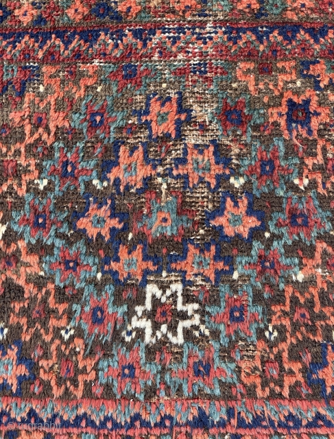 Baluch Bagface with lovely colors, shaggy pile with some corrosion and old moth nibbles, mixed wefting, cotton, wool and camel hair? - mete@yorukruggallery.com          