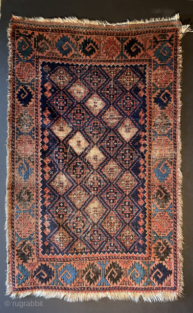 Early small Baluch rug with beautiful colors and rare border - reasonably priced                    