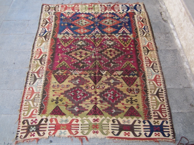 Anatolian kilim vegetable dyes.
150years old.size 150x120.                           