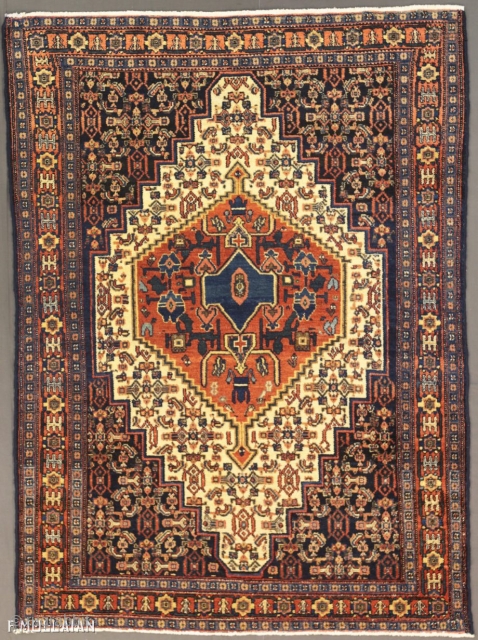 Antique Persian Senneh Rug, 1900-1920
150 × 110 cm (4' 11" × 3' 7")
                    