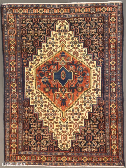 Antique Persian Senneh Rug, 1900-1920
150 × 110 cm (4' 11" × 3' 7")                    