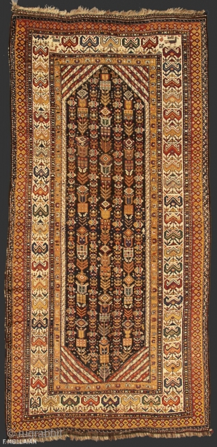 This is an antique Kurdish rug from the northwest of Persia and it was woven circa 1920. It has been woven on a 100% wool foundation with all wool pile and all  ...