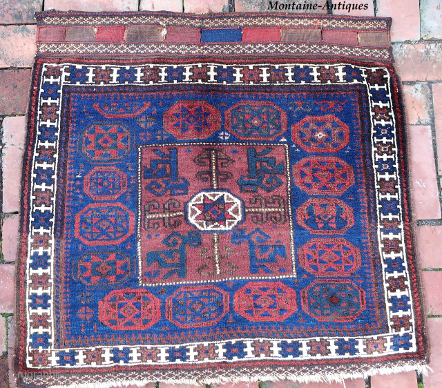 Large Baluch "Star" Bag Face-- approx 32 × 34”

Most Baluch “star” bags have octagonal hearth medallions; this one is square with unusual purple dye. Large, book-worthy old collector’s piece.

Ex James Douglas personal  ...