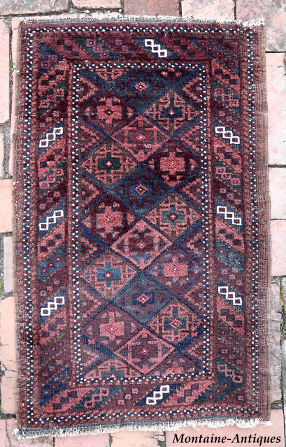 Baluch Balisht Small Rug-- approx 18 × 30” 
Plush little Sistan piece from Persia/Afghan border region. Note sporadic but symmetrical use of white elements in the border.

Ex James Douglas personal collection. Mr.  ...