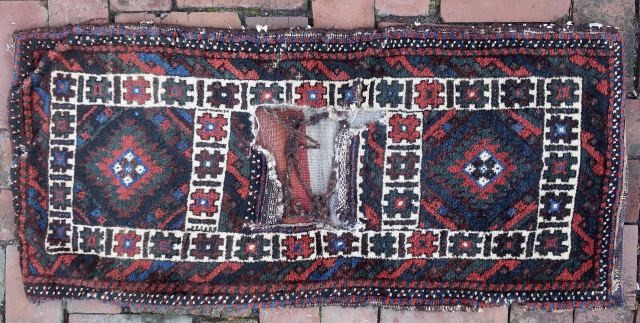 Small Sistan Baluch Khorgin-- approx 18 × 20” (each bag)
Plush folky Khorgin pair with striped kelim back.

Ex James Douglas personal collection. Mr. Douglas was a scholar and aficionado of Mideast tribal weaving.  ...