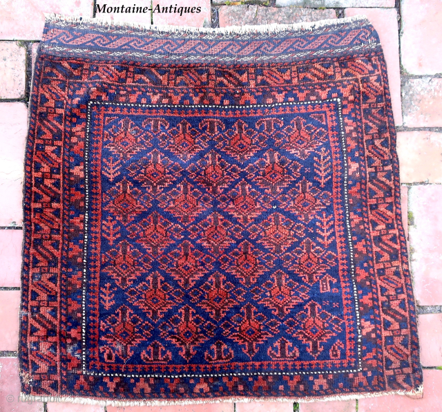 Timuri Baluch Bag Face-- approx 26 × 27”

Afghan border and running dog kelim. Possibly Khorasan.

Ex James Douglas personal collection. Mr. Douglas was a scholar and aficionado of Mideast tribal weaving. His research  ...