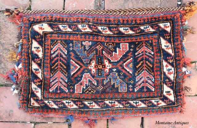 Small Antique Persian Tribal Bag-- 12 × 19” 

Weave suggests southwest; design suggests Kurdish. Beloved little personal bag.

CONDITION: A bit of of use-wear (as shown).
Call Rob @ the shop for discussion of  ...