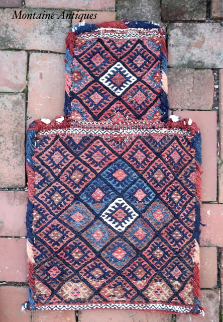 Kurdish Soumak Salt Bag--15 × 25”

Likely West Persian Kurd with diamond latch hook motifs. Original back; unique interior cotton lining is original.

CONDITION: Very good; all original.

Call Rob @ the shop for discussion  ...
