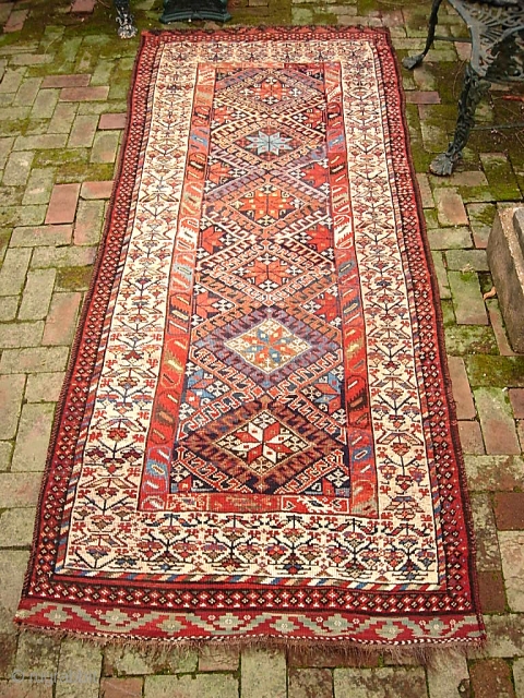 Kurdish. 3 ft 10 in  x 9 ft 0 in-- Glowing circa 19th century. White border with early Sauj Bulak design. Referred to as Western Mountains Kurd as well as Sauj  ...