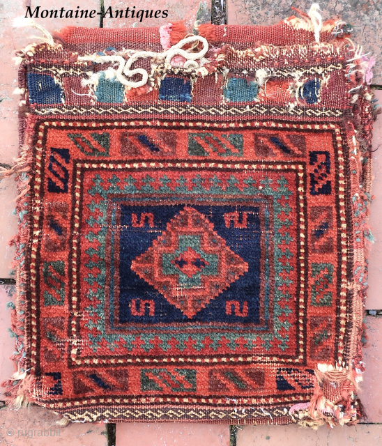  Baluch Chanta Khorgin Pair of Bags— approx 12 × 12”
 
Blue cross within diamond medallion. Well used little ethnographic textile.

Ex James Douglas personal collection. Mr. Douglas was a scholar and aficionado  ...