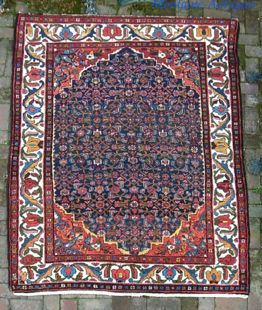 Bahktiari-- 5 ft 1  x 6 ft 10 inches. Lively and decorative with ivory border and lots of different colors.  Looks like there is foundation showing in the yellow in  ...